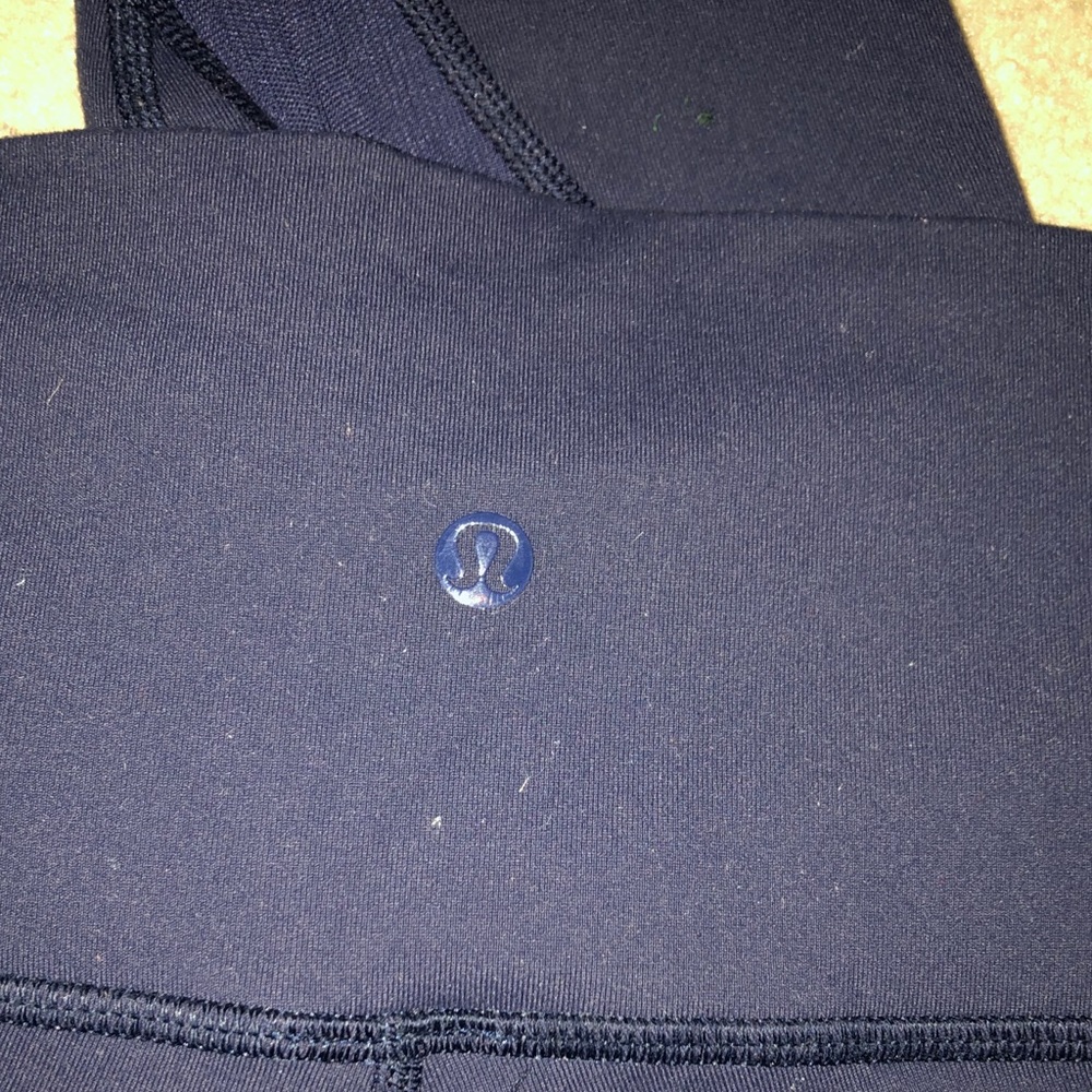 Lulu Lemon navy blue leggings with mesh cut outs